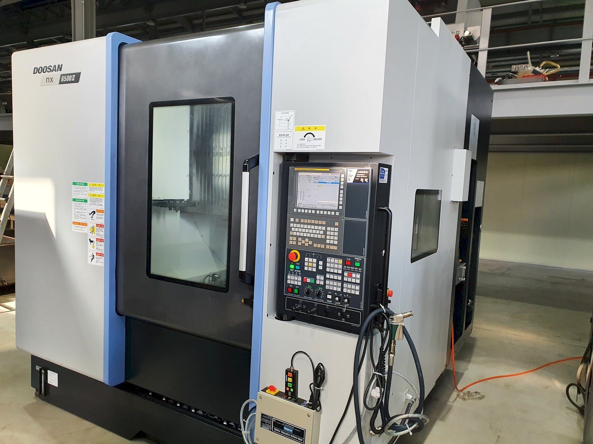 Doosan NX6500Ⅱ Mašinos vaizdas iš priekio