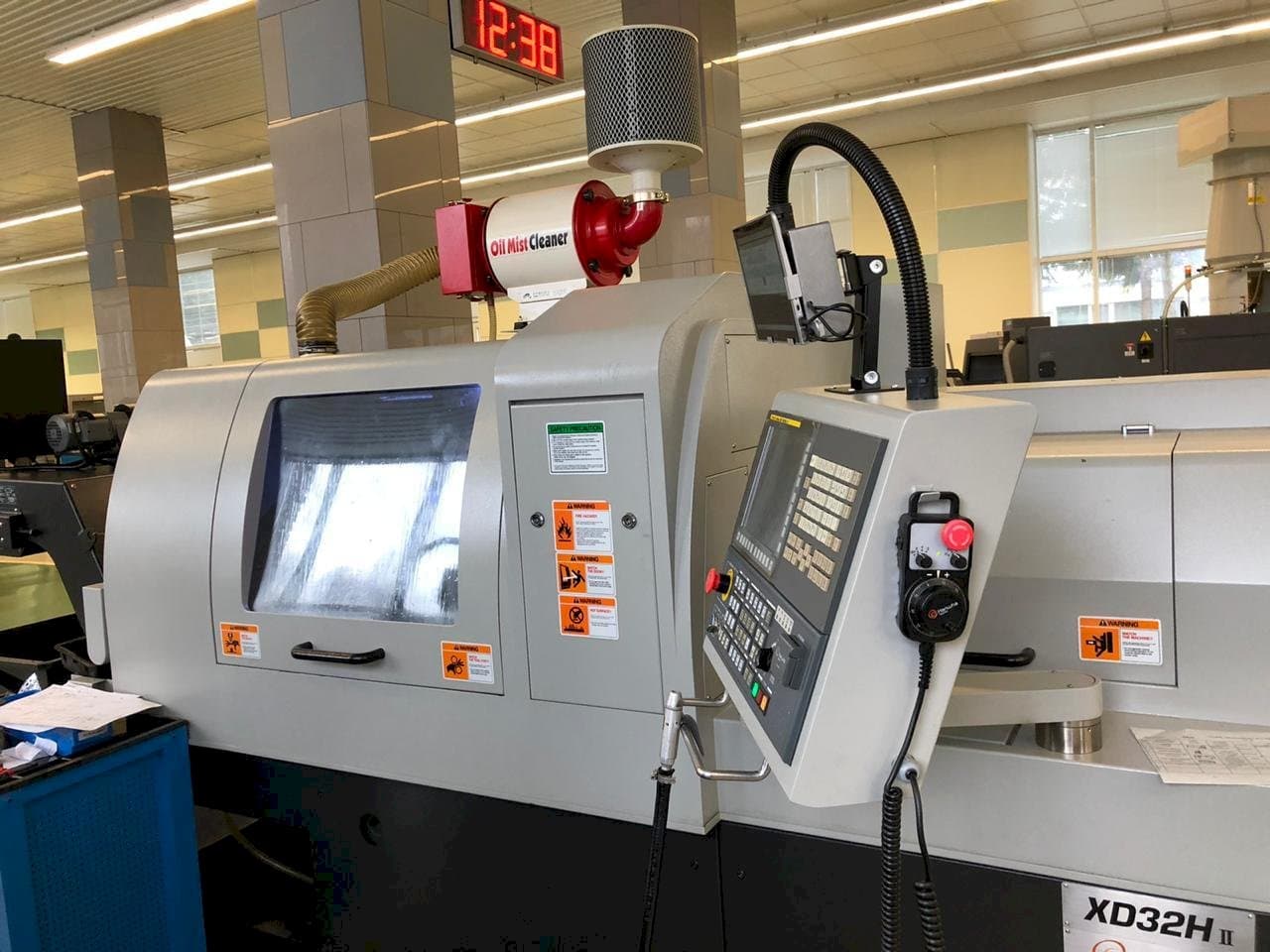 Hanwha XD32H II Mašinos vaizdas iš priekio