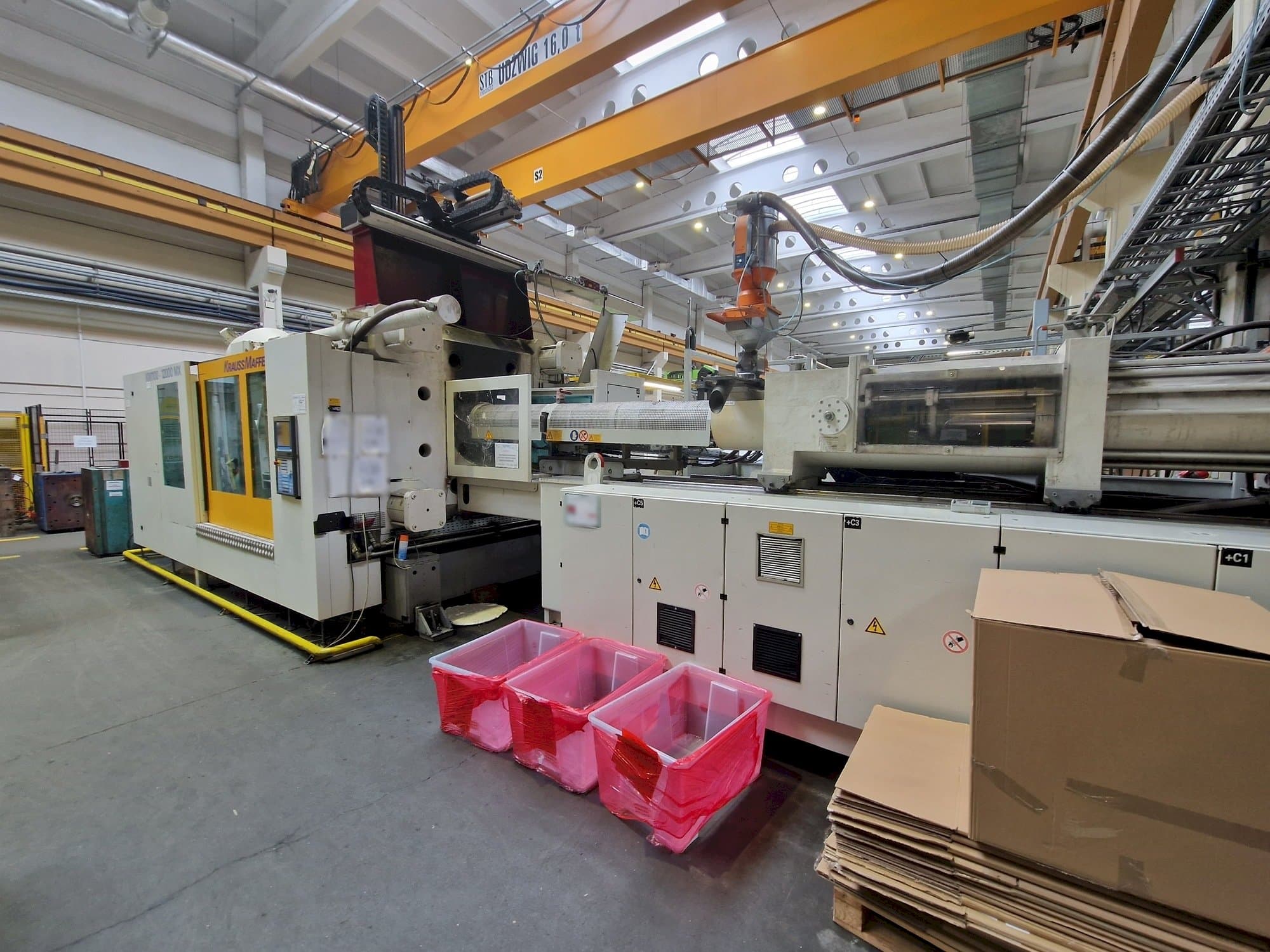 Krauss Maffei 1100-12000 MX Mašinos vaizdas iš priekio