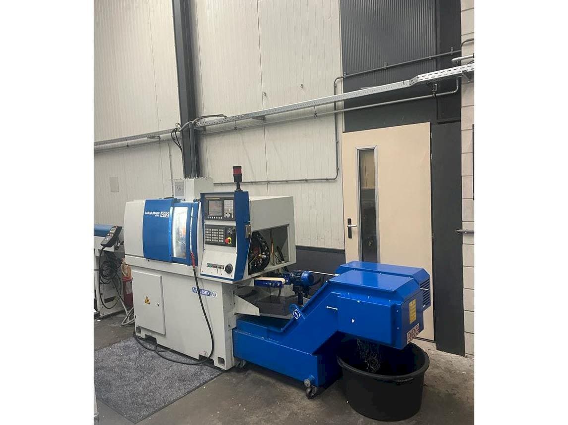 Manurhin K'MX 413 Mašinos vaizdas iš priekio