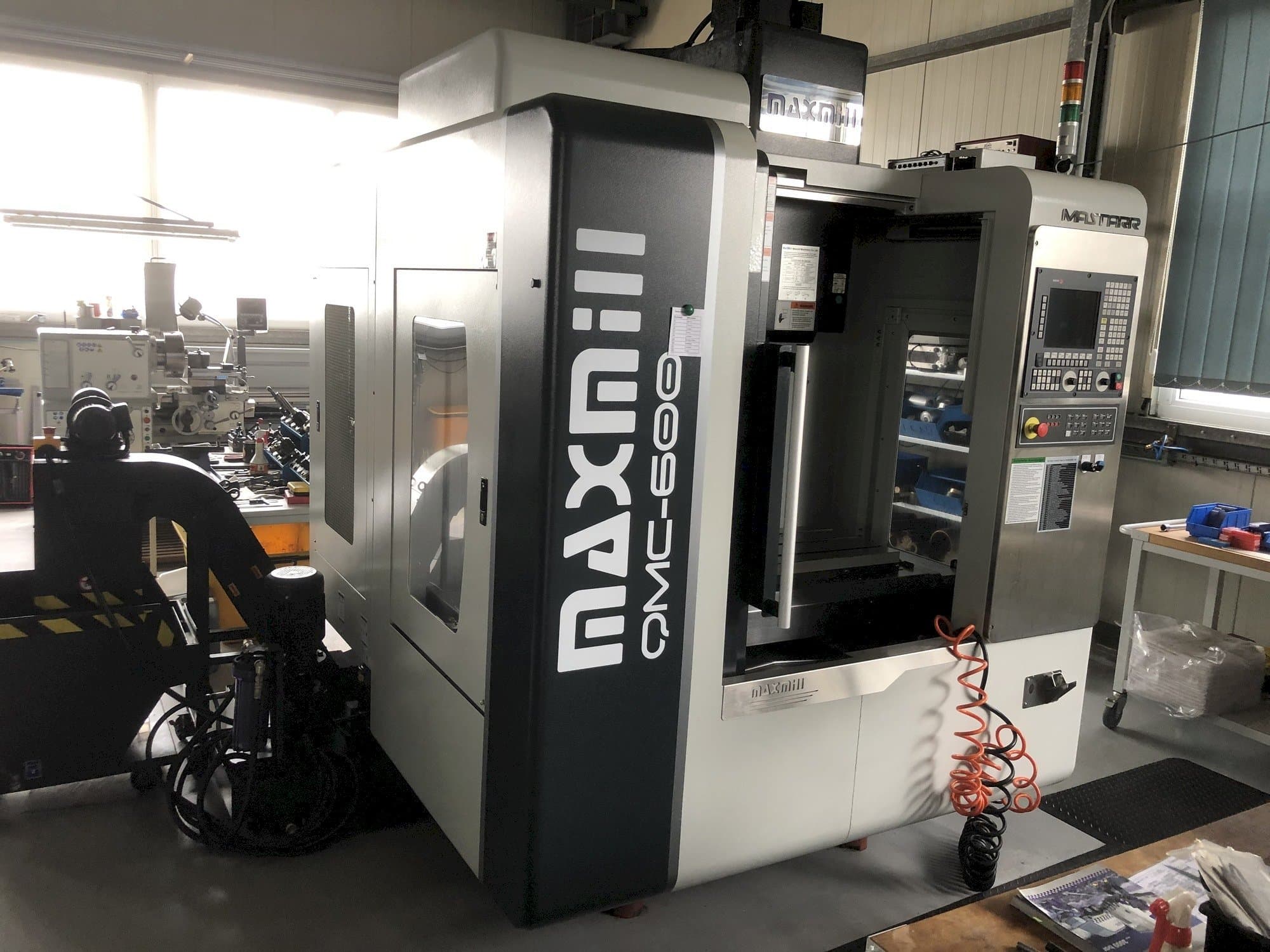 MAXMILL QMC-600 Mašinos vaizdas iš priekio