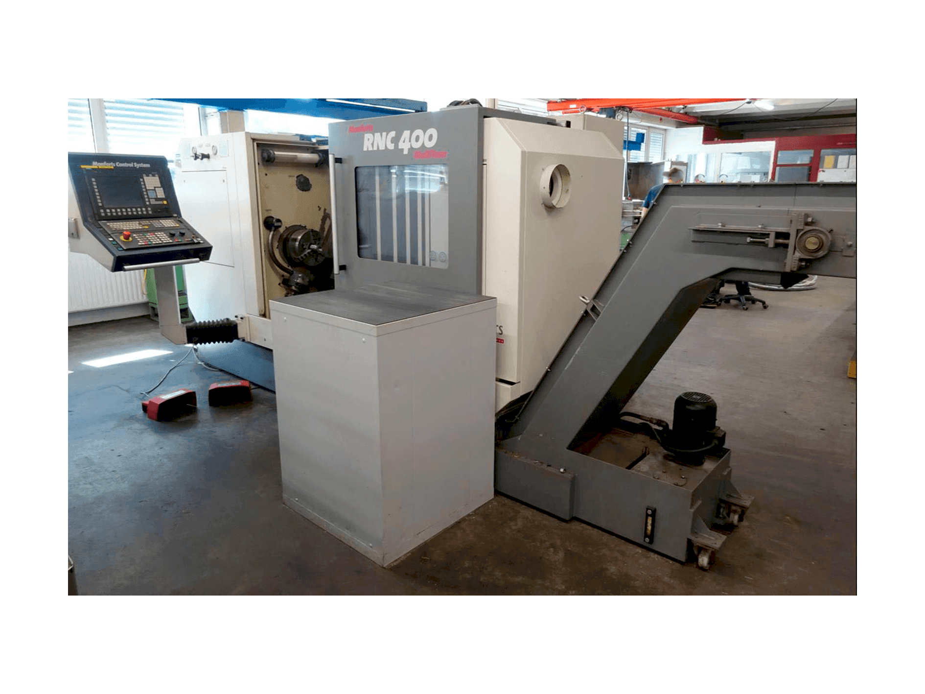 Monforts RNC 400 MultiTurn Mašinos vaizdas iš kairės pusės