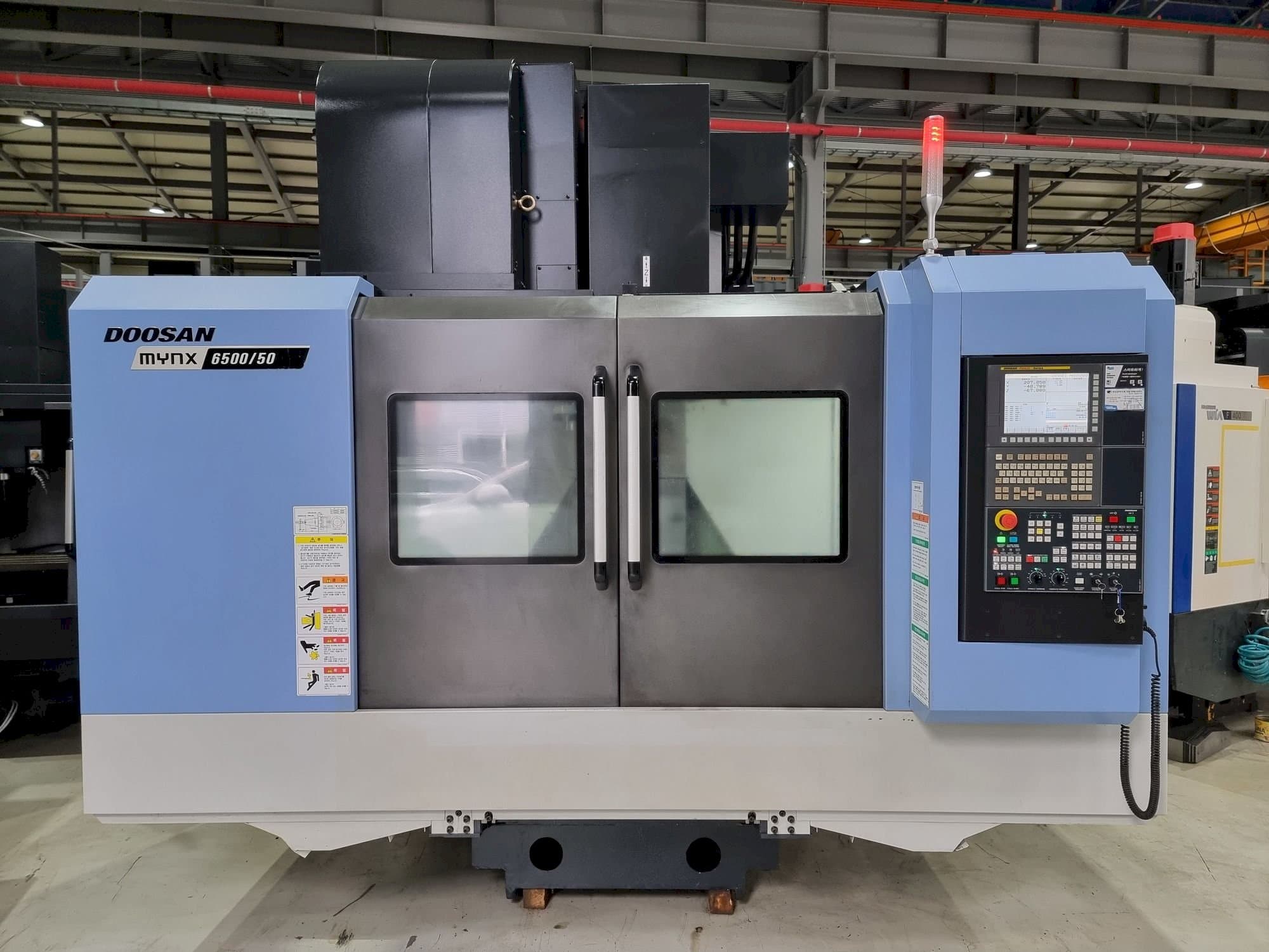 Doosan MYNX 6500/50 Mašinos vaizdas iš priekio