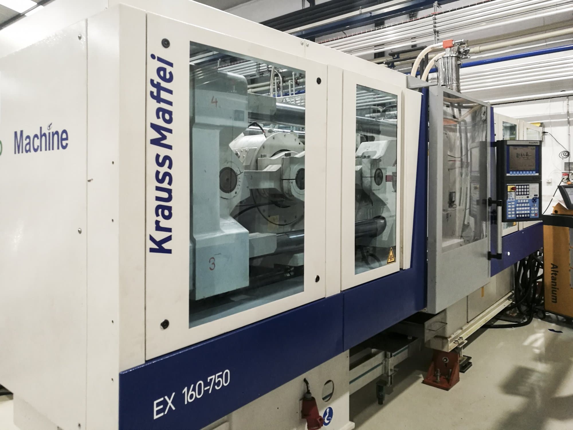 Krauss Maffei 160-750 EX Mašinos kairės pusės vaizdas