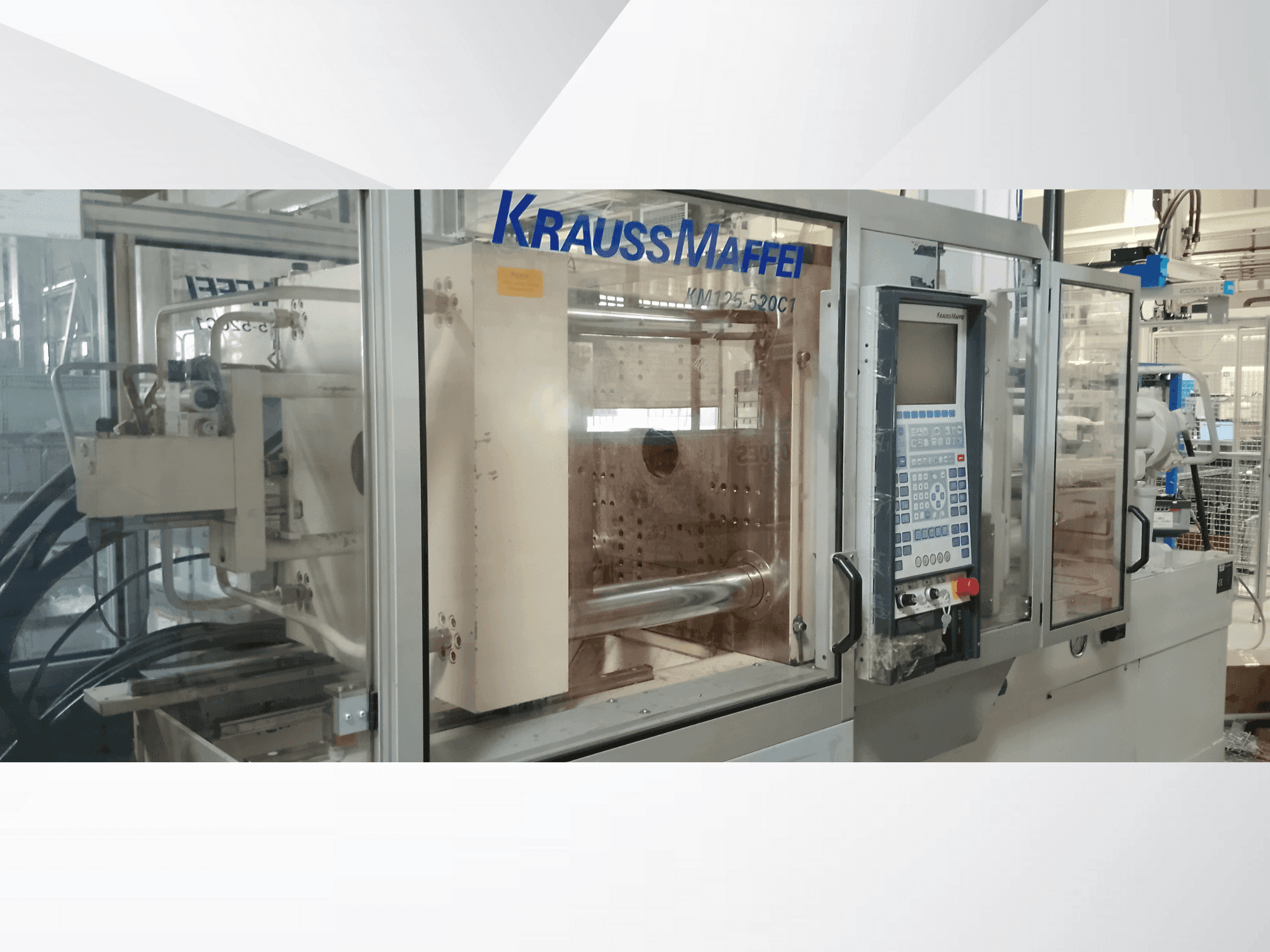 Krauss Maffei 125-520 C1 Mašinos vaizdas iš priekio