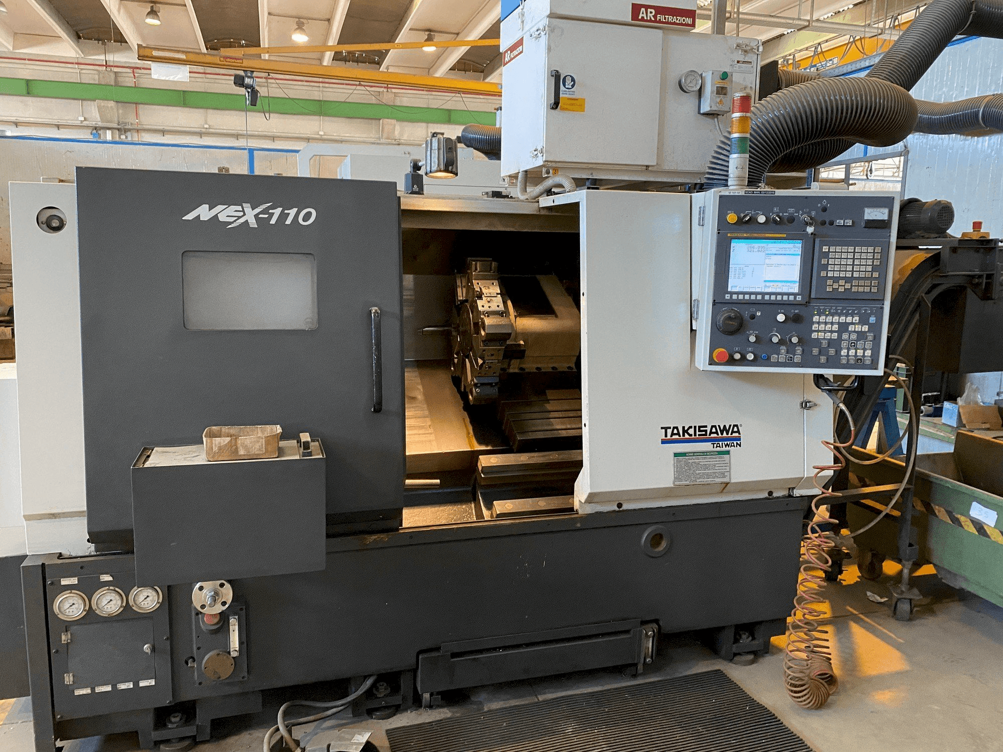 Takisawa NEX-110 Mašinos vaizdas iš priekio