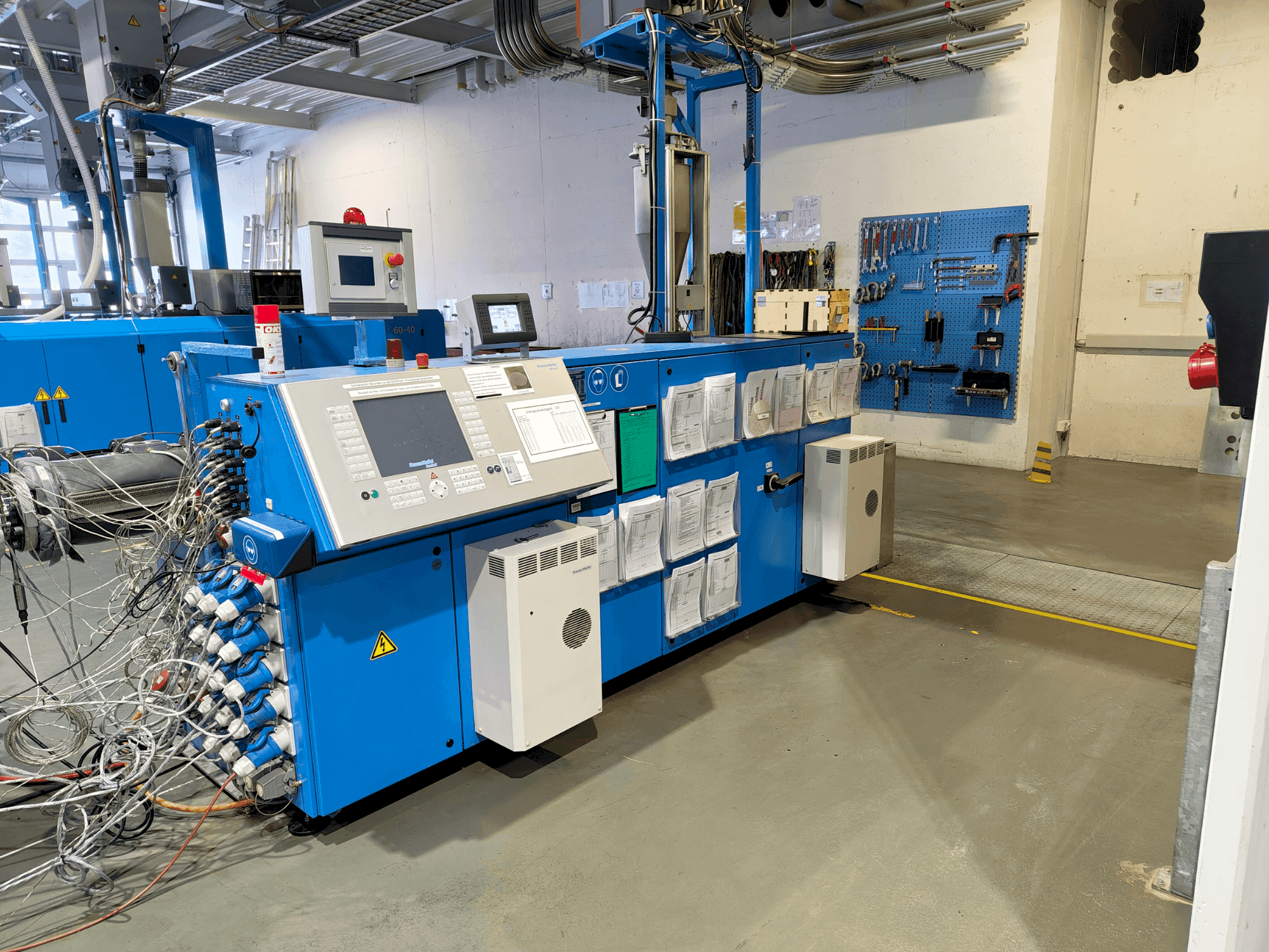 Krauss Maffei KME 75-36 R AC Mašinos vaizdas iš priekio