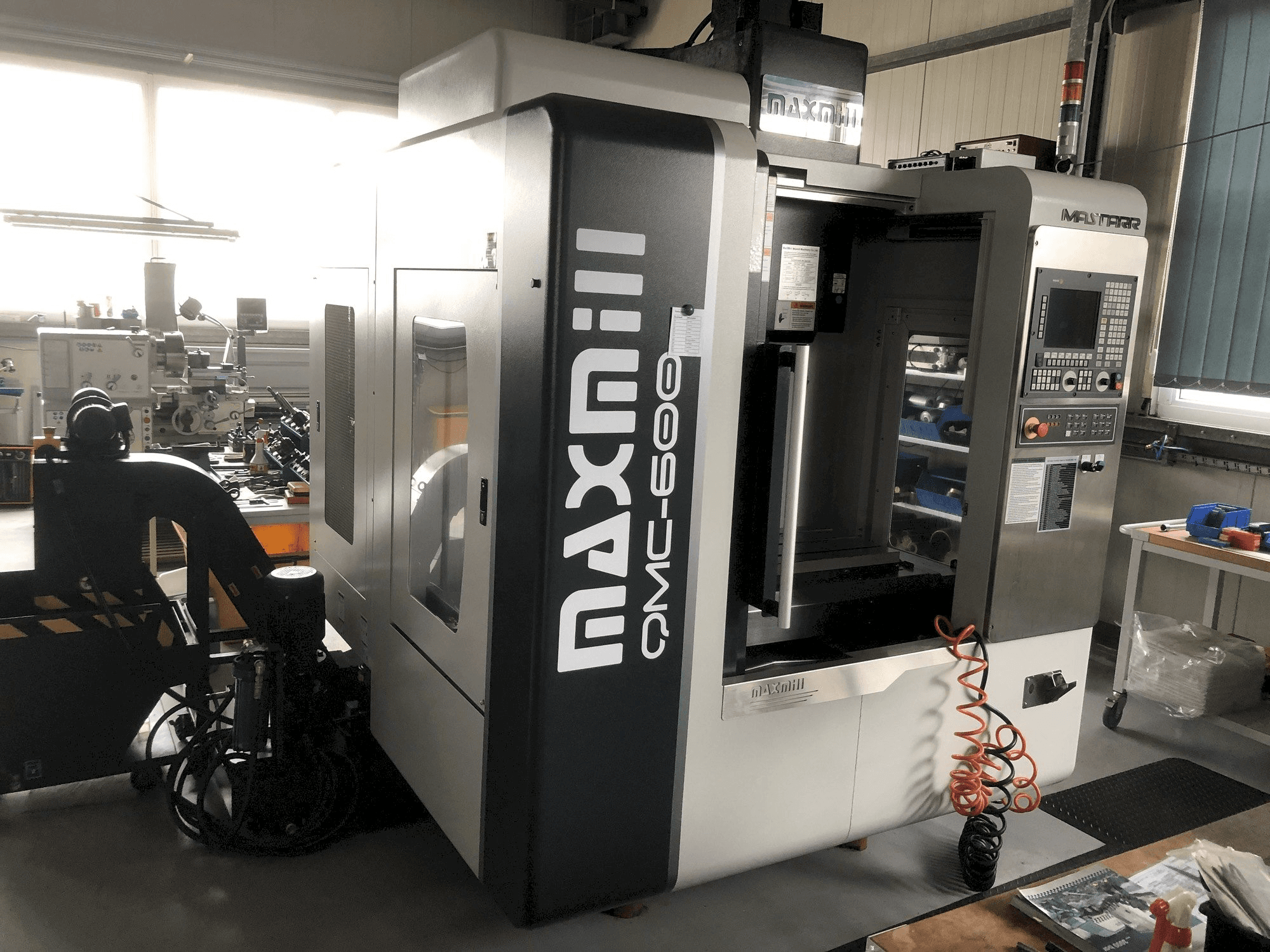 MAXMILL QMC-600 Mašinos vaizdas iš priekio