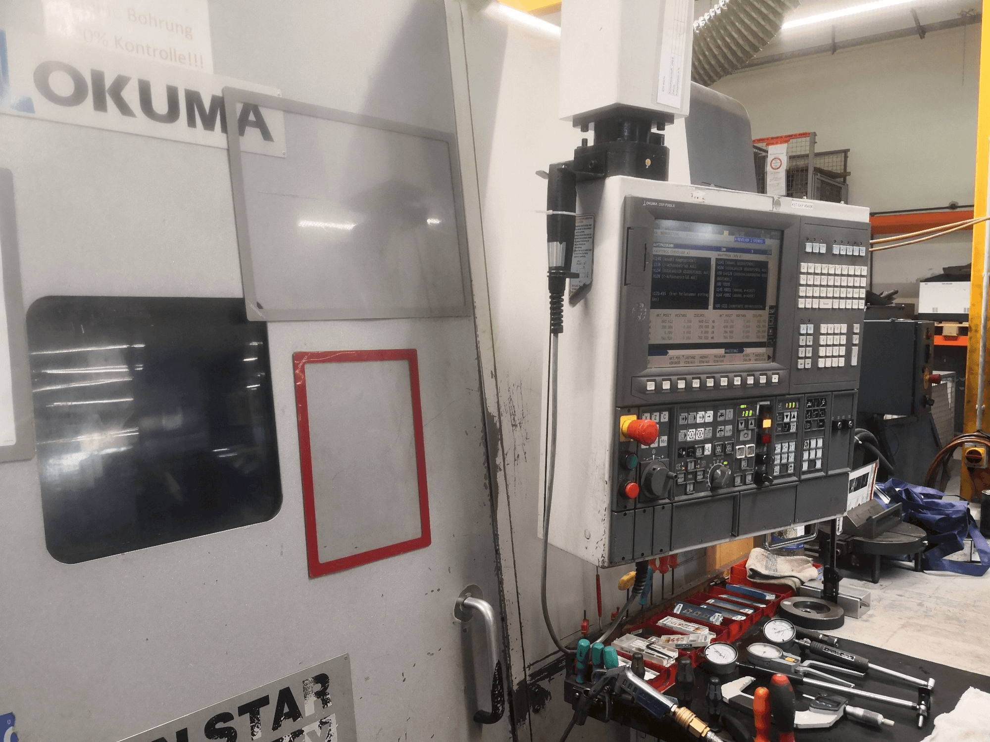 Okuma LT 300 MY Mašinos vaizdas iš priekio