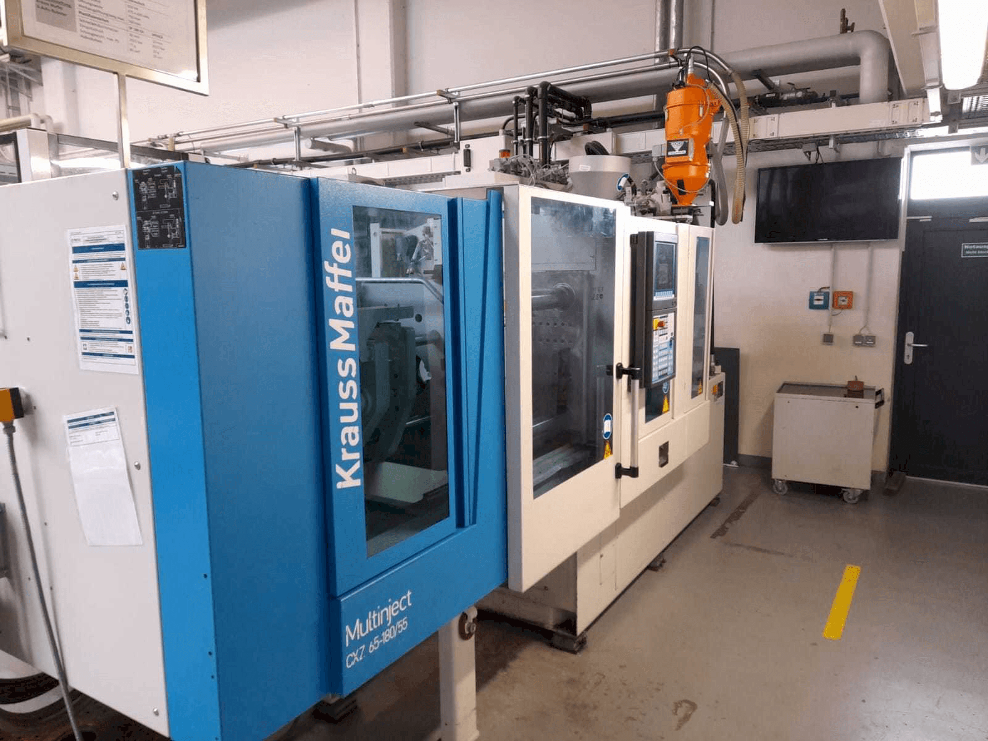 Krauss Maffei KM 65/80 CX Mašinos vaizdas iš priekio