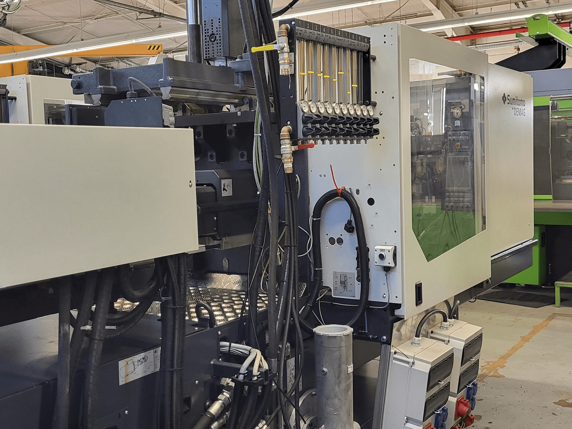 Sumitomo SHI DEMAG Systec Multi 120/470-200h/80V Mašinos vaizdas iš kairės pusės