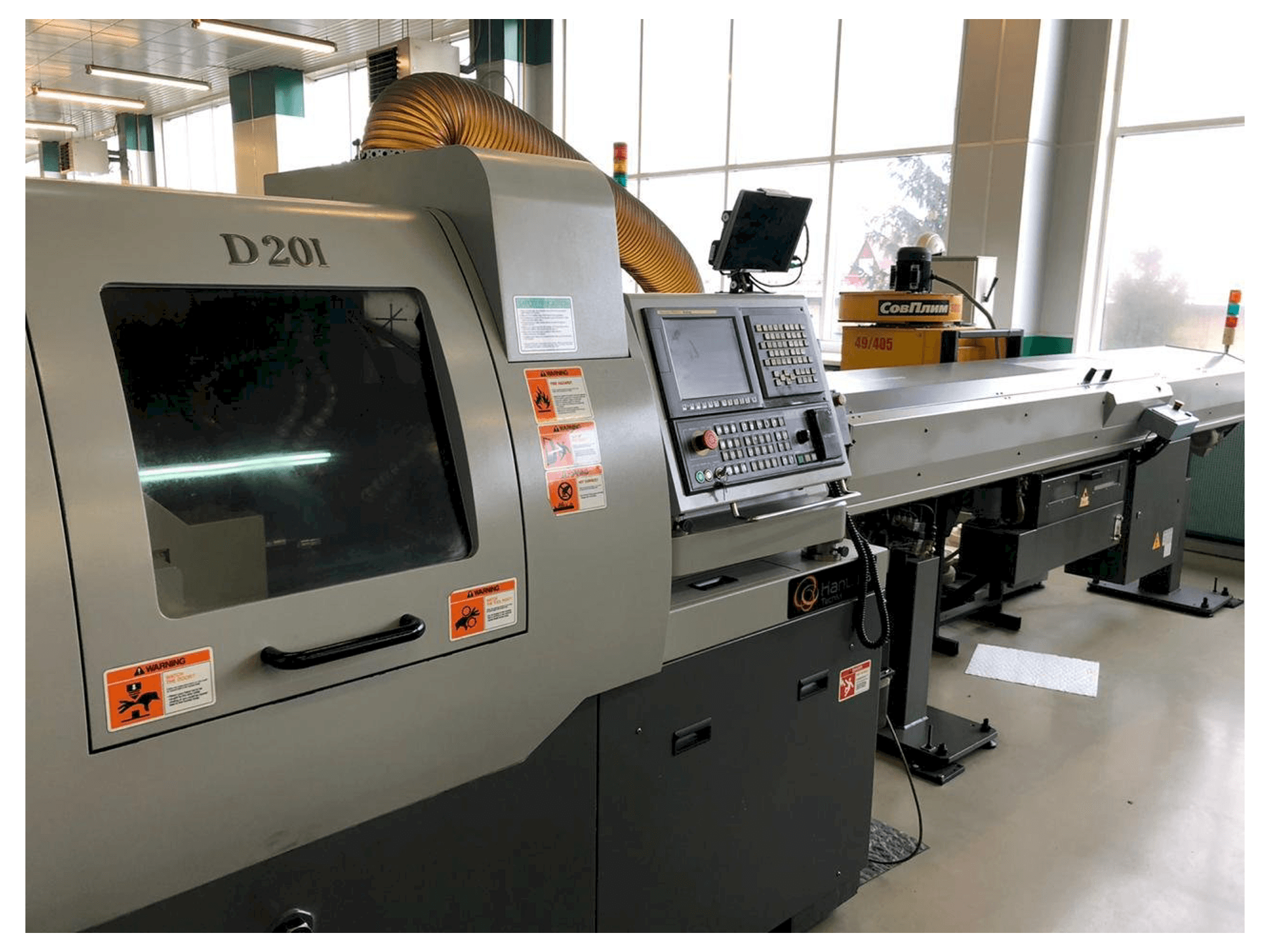 Hanwha XD20M Mašinos vaizdas iš priekio