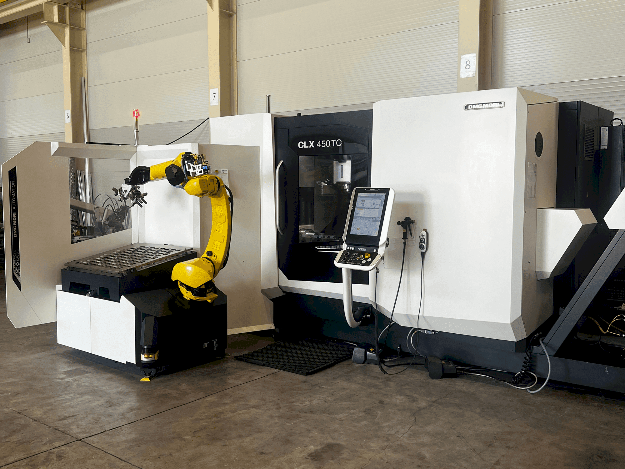 DMG MORI CLX 450 TC Mašinos vaizdas iš priekio
