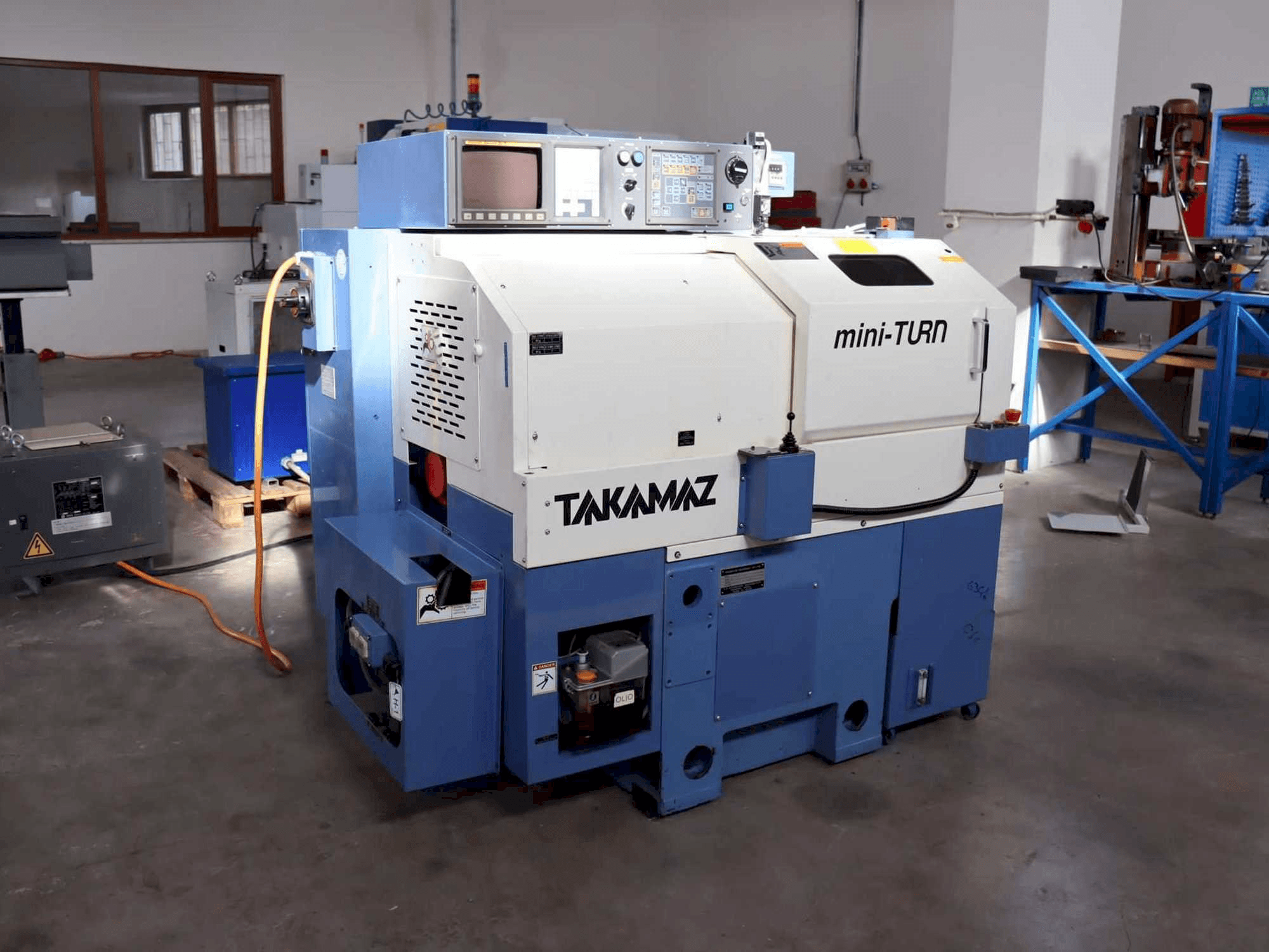 Takamaz mini-Turn Mašinos vaizdas iš priekio