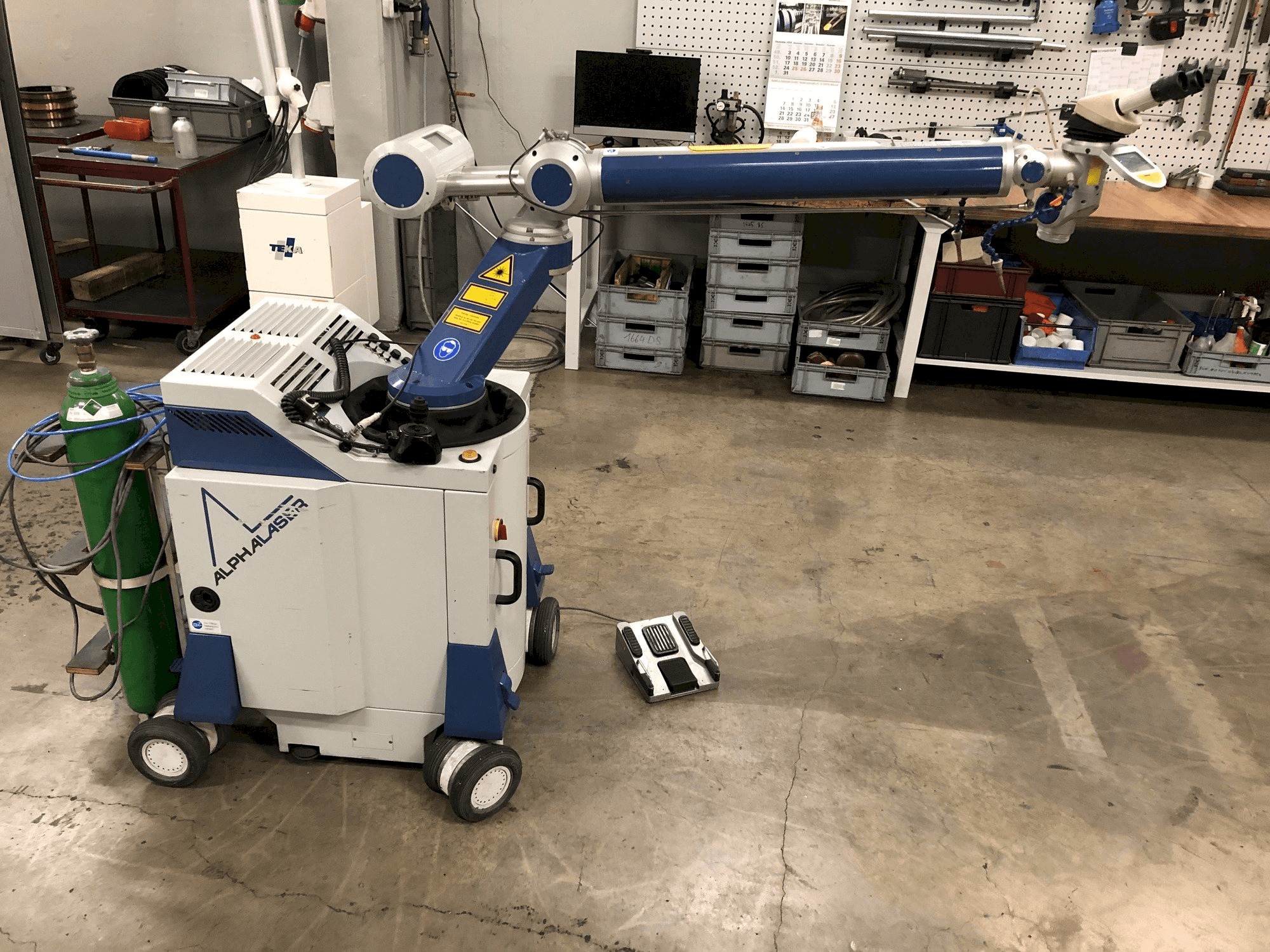 ALPHA LASER ALM 200 Mašinos kairės pusės vaizdas