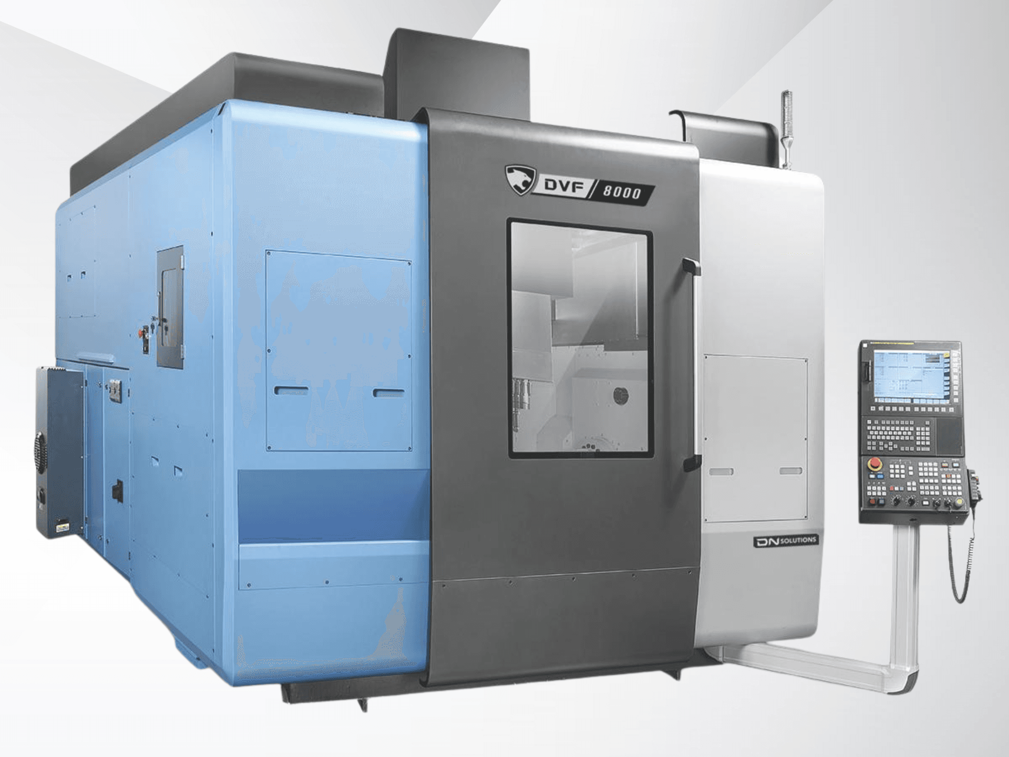 Universalus apdirbimo centras „DN SOLUTIONS DVF 8000“, vaizdas iš priekio, kuriame matomas valdymo pultas ir dviejų atspalvių išorės dizainas.