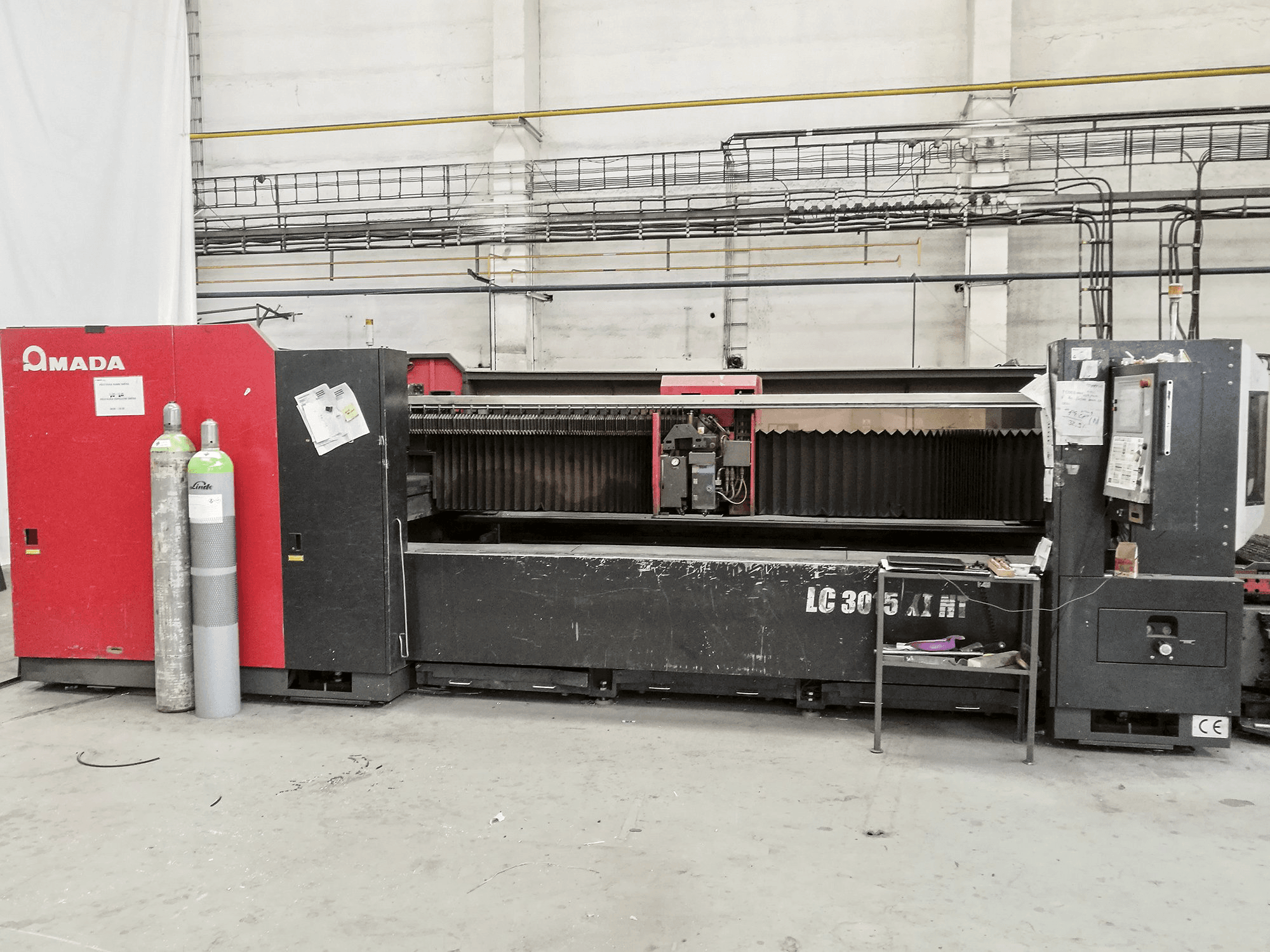 AMADA LC 3015 X1 NT Mašinos vaizdas iš priekio