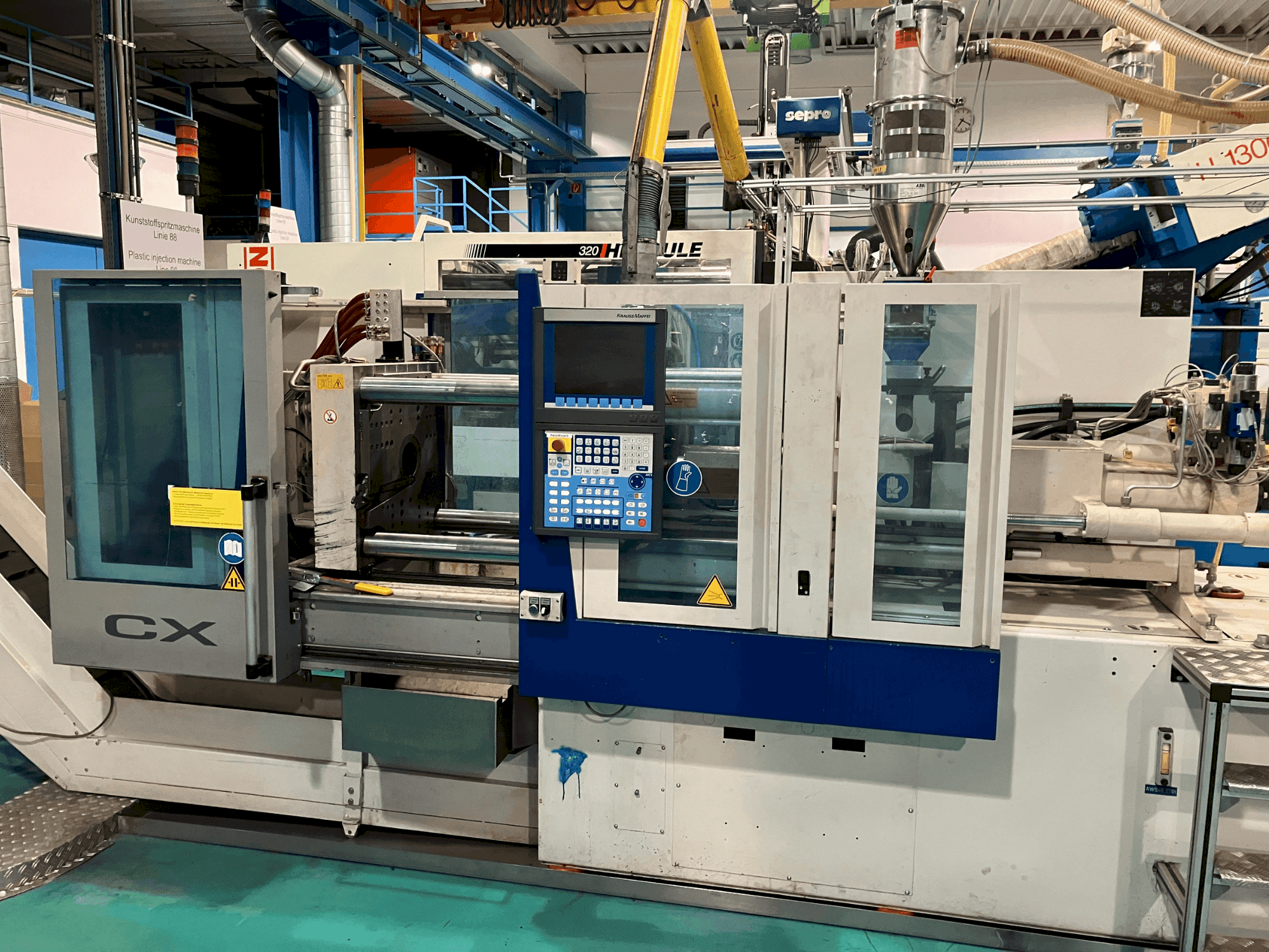 Krauss Maffei 65-180 CX Mašinos vaizdas iš priekio