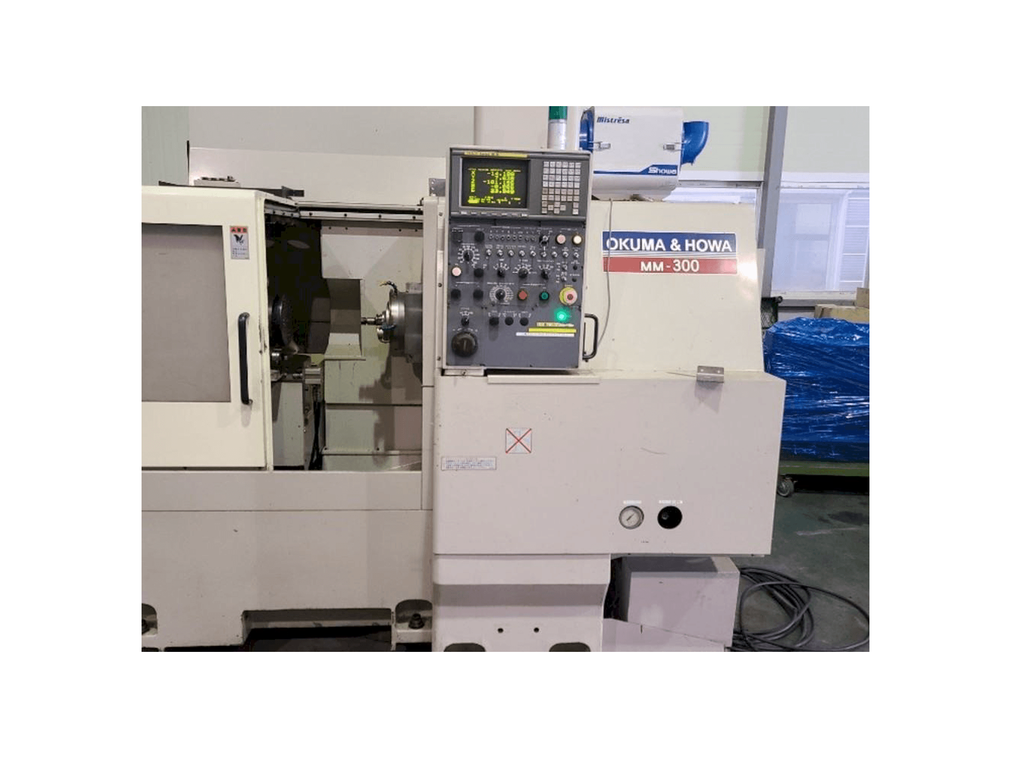 OKUMA&HOWA MM-300 Mašinos vaizdas iš priekio