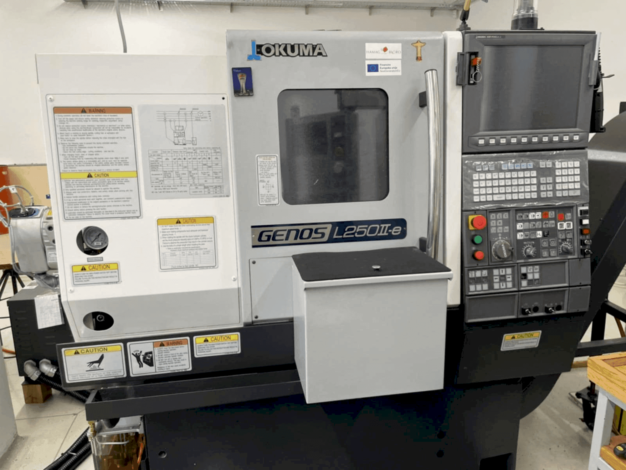 Okuma GENOS L250IIe Mašinos vaizdas iš priekio