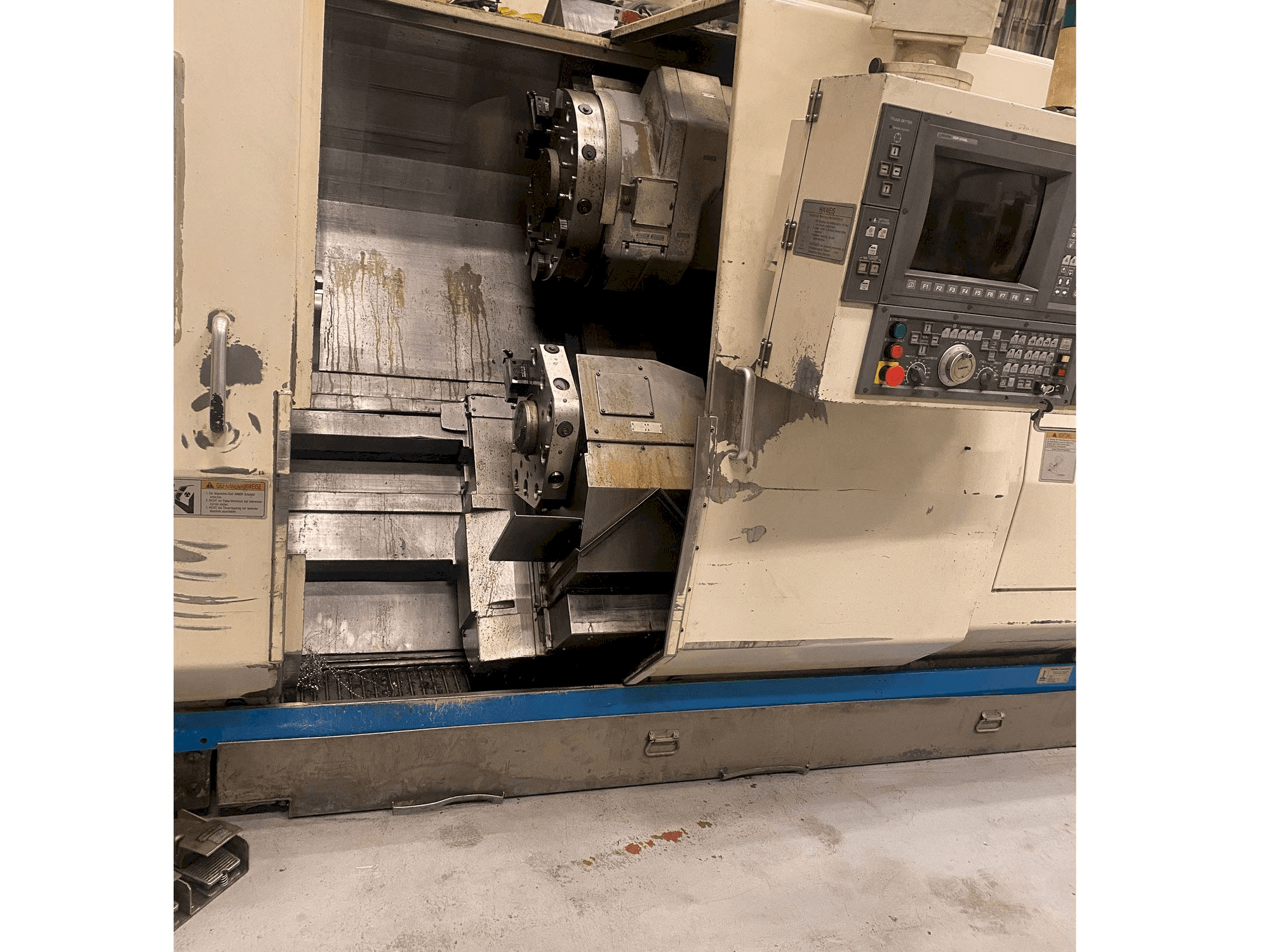 Okuma LU 25 Mašinos kairės pusės vaizdas