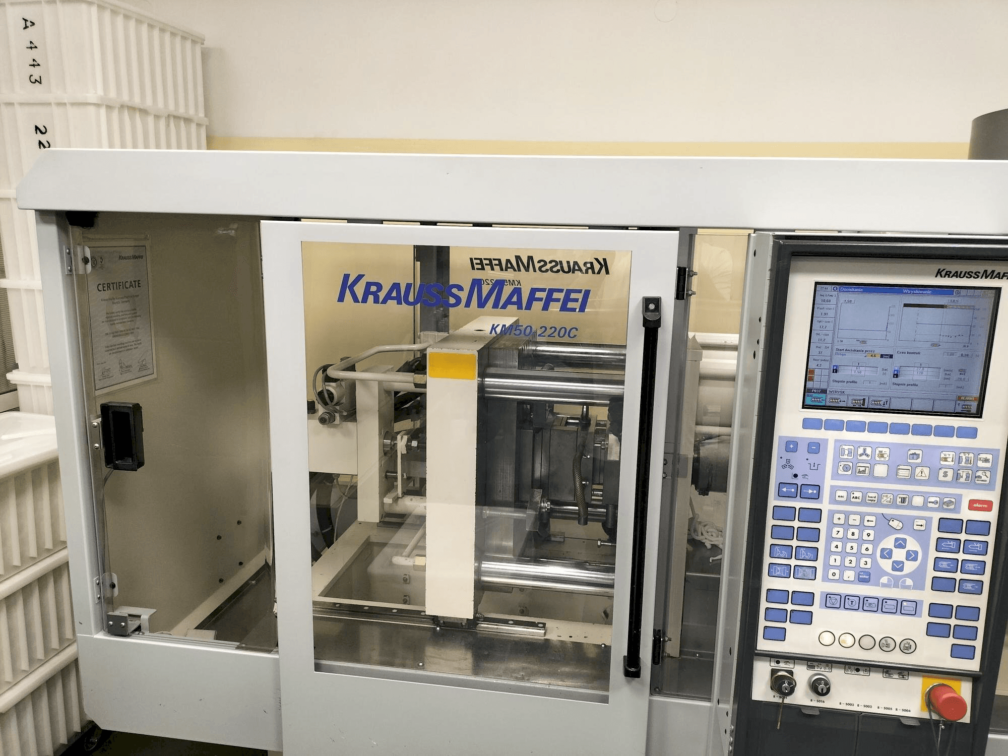 Krauss Maffei KM 50-220C Win Mašinos vaizdas iš priekio