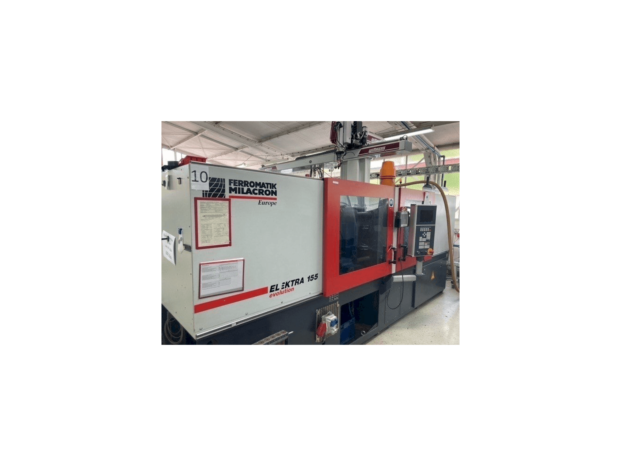 FERROMATIK MILACRON EE 155 Mašinos vaizdas iš priekio