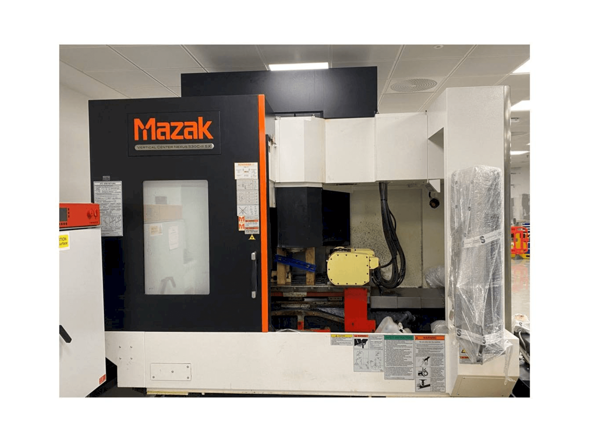 Mazak Vertical Center Nexus 530C-II 5X Mašinos vaizdas iš priekio