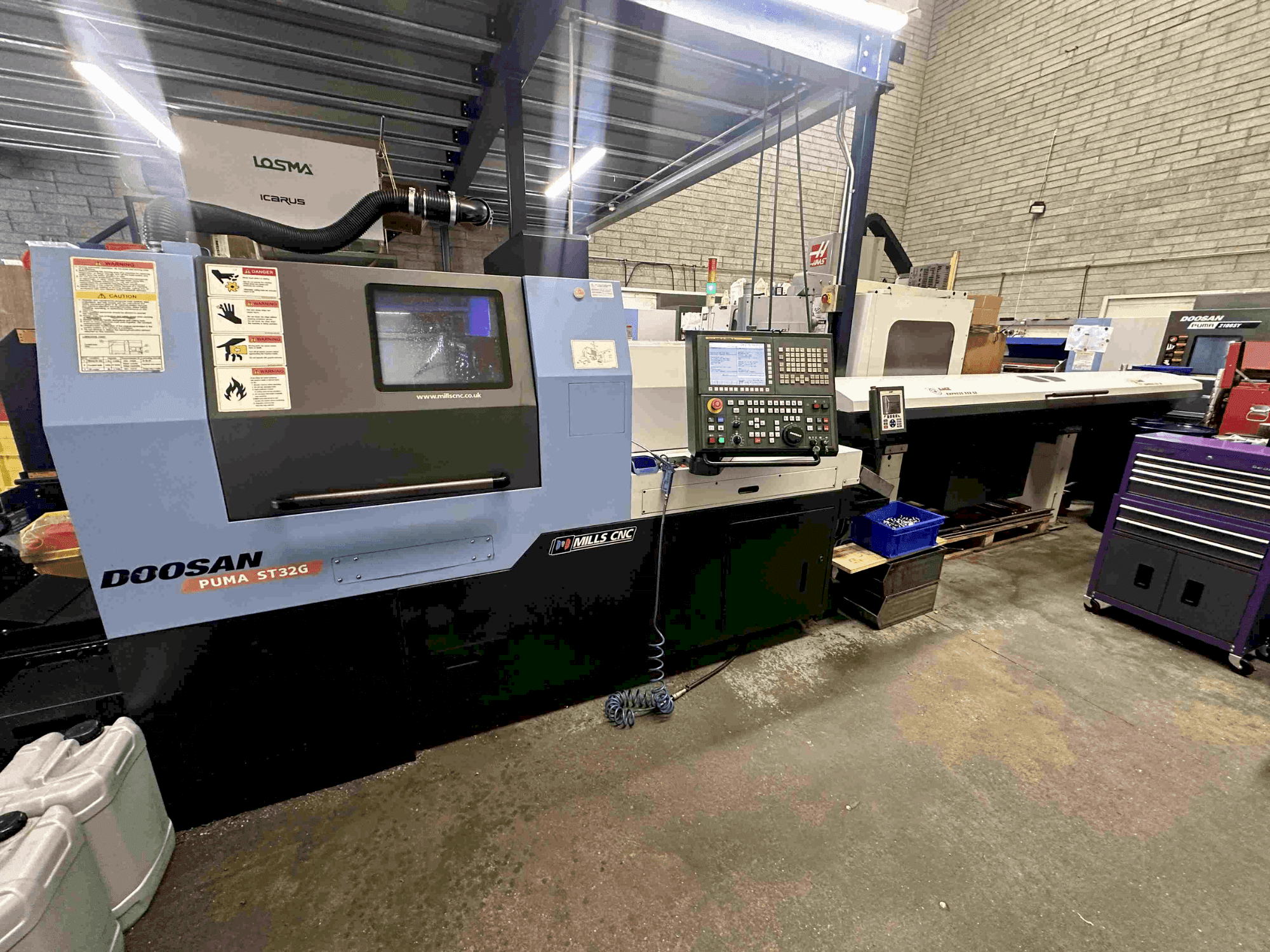 DOOSAN Puma ST32G Mašinos vaizdas iš priekio