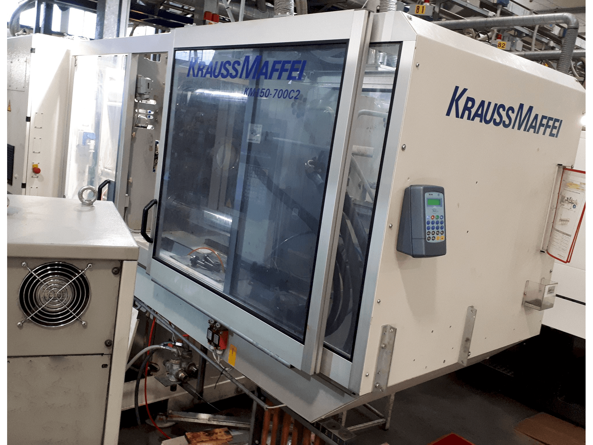 Krauss Maffei Mašinos dešinės pusės vaizdasC2 150-700