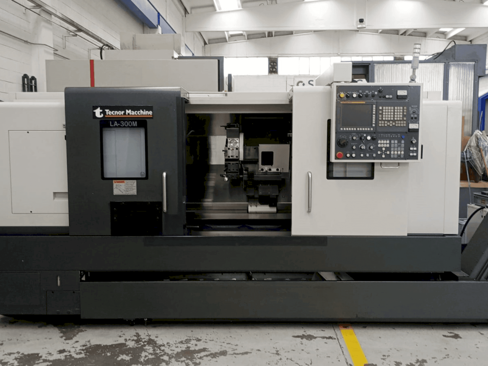 Takisawa LA-300 CNC Mašinos vaizdas iš priekio