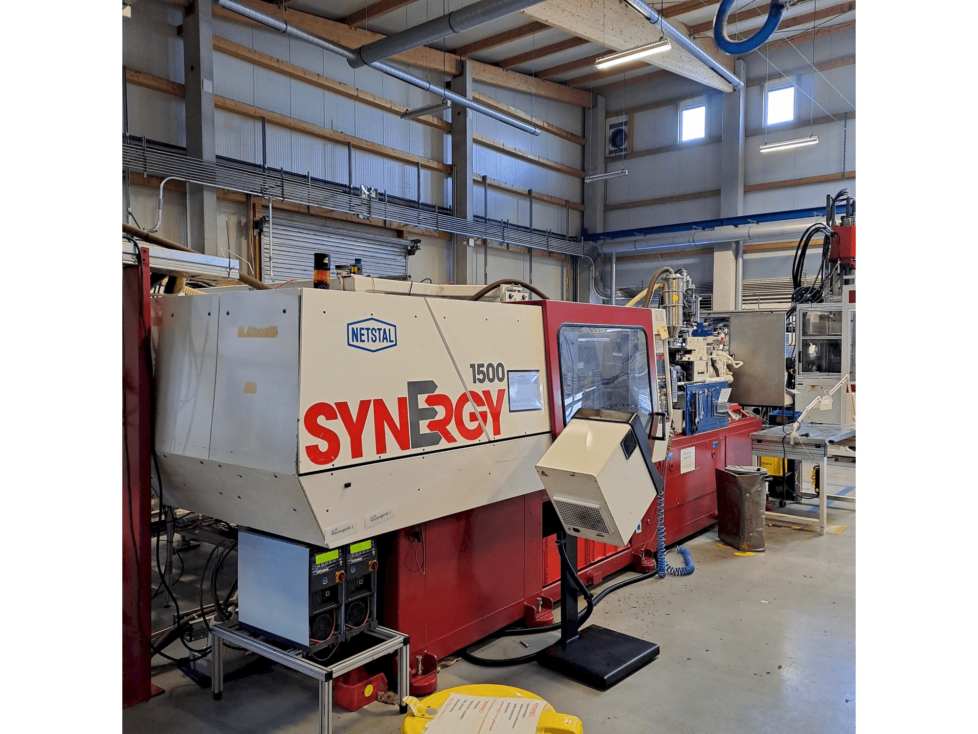 Netstal S 1500 - 460 Mašinos vaizdas iš priekio