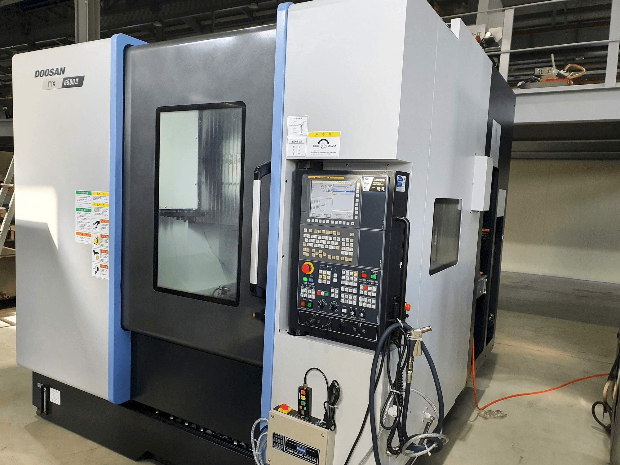 Doosan NX6500Ⅱ Mašinos vaizdas iš priekio