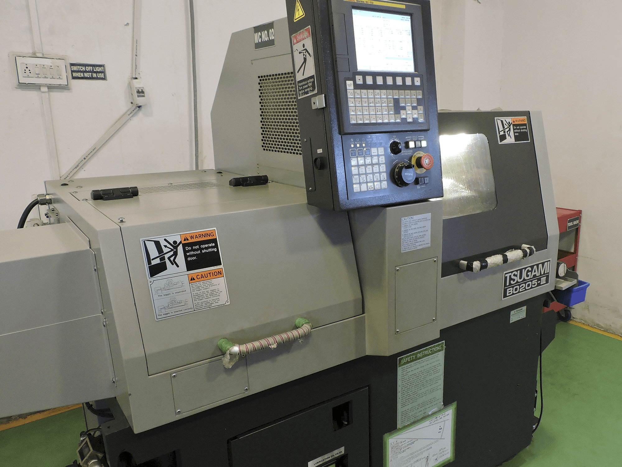 TSUGAMI Mašinos kairės pusės vaizdasB0205-III