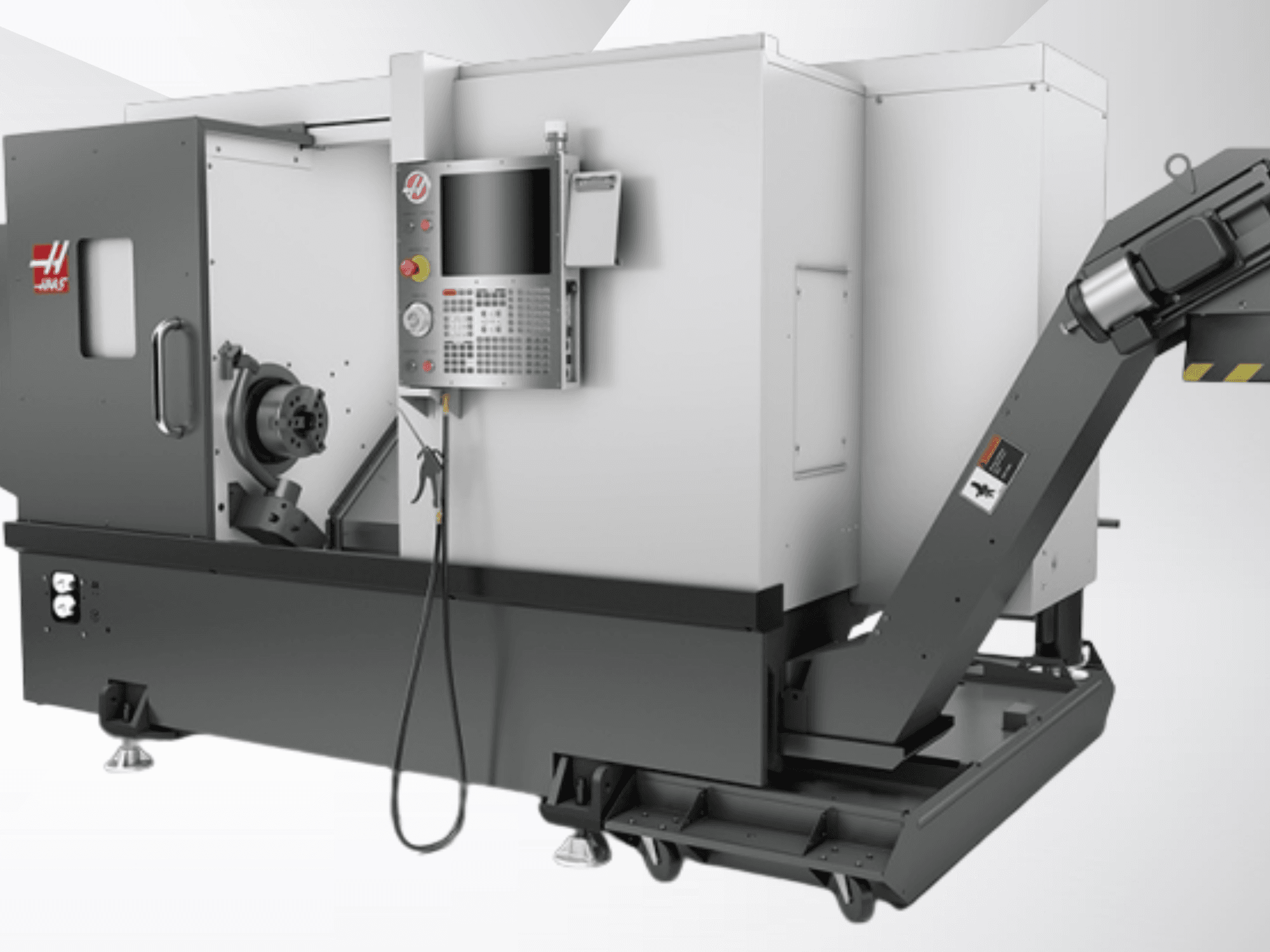 Haas ST-20 horizontalus tekinimo staklės; vaizdas iš priekio, kuriame matomas valdymo pultas, suklis ir drožlių konvejerio konstrukcija.