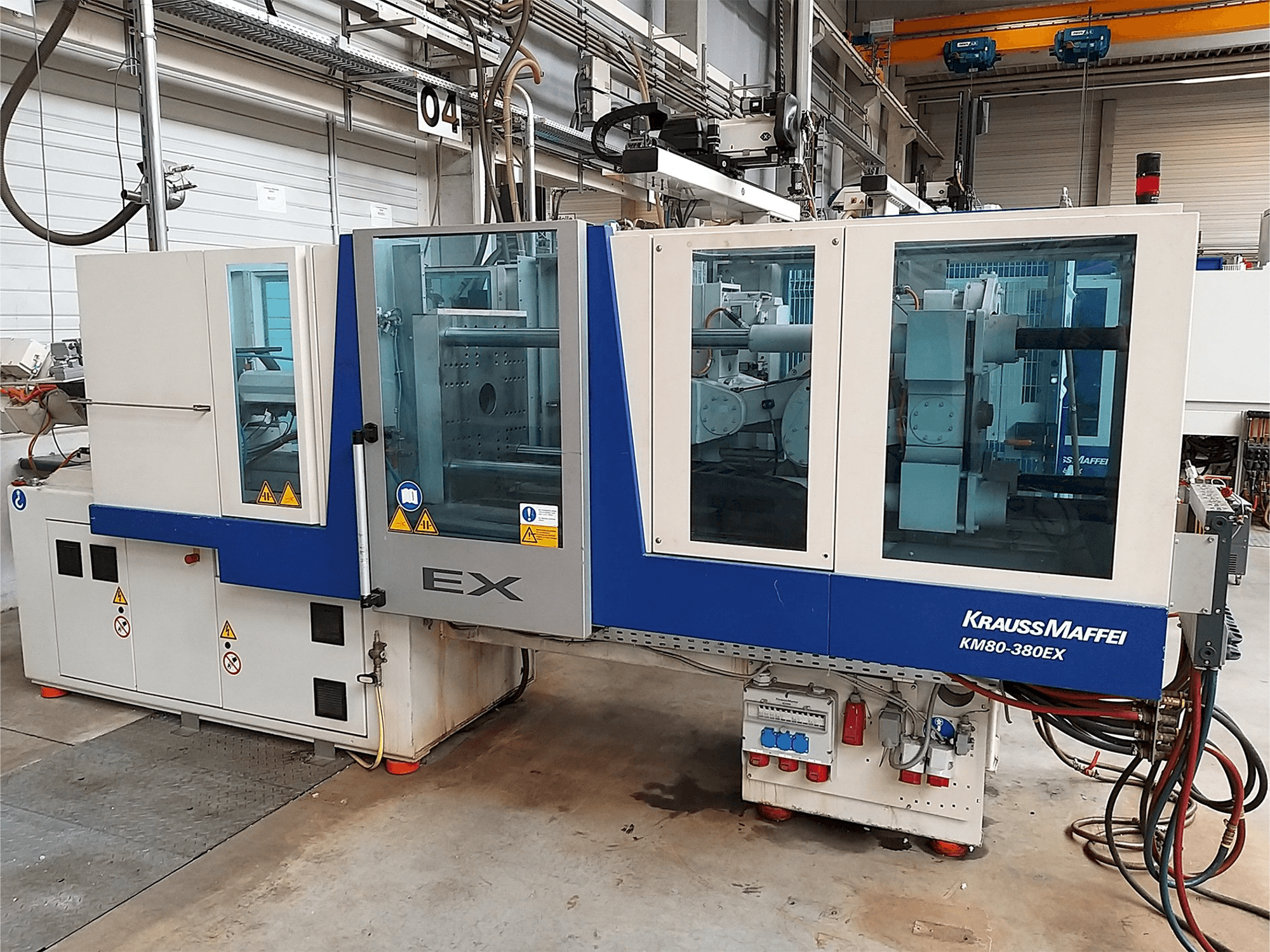 Krauss Maffei 80-380 Ex Mašinos vaizdas iš priekio