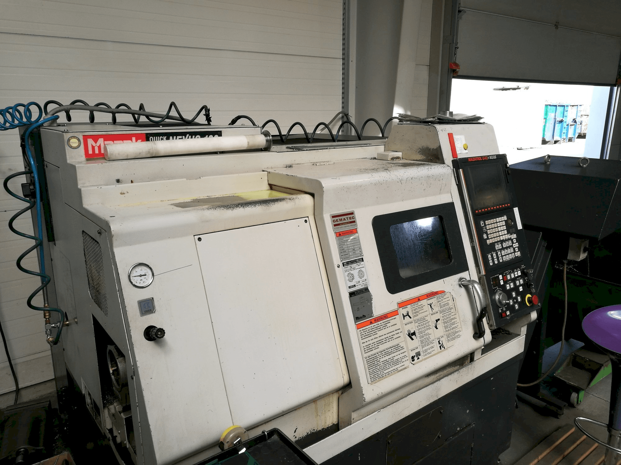 Mazak QT NEXUS 100 Mašinos vaizdas iš kairės pusės