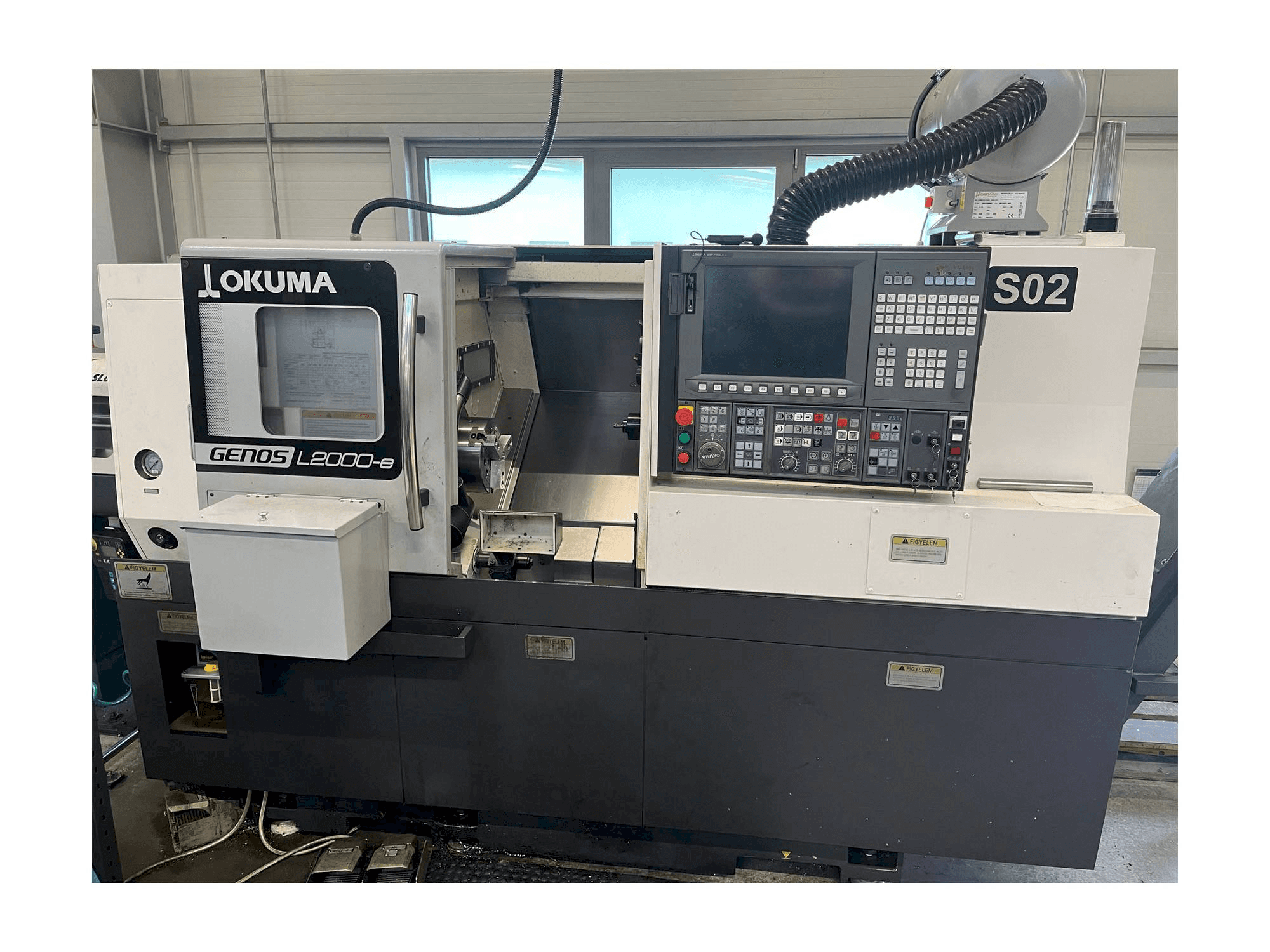 Okuma GENOS L200 Mašinos vaizdas iš priekio