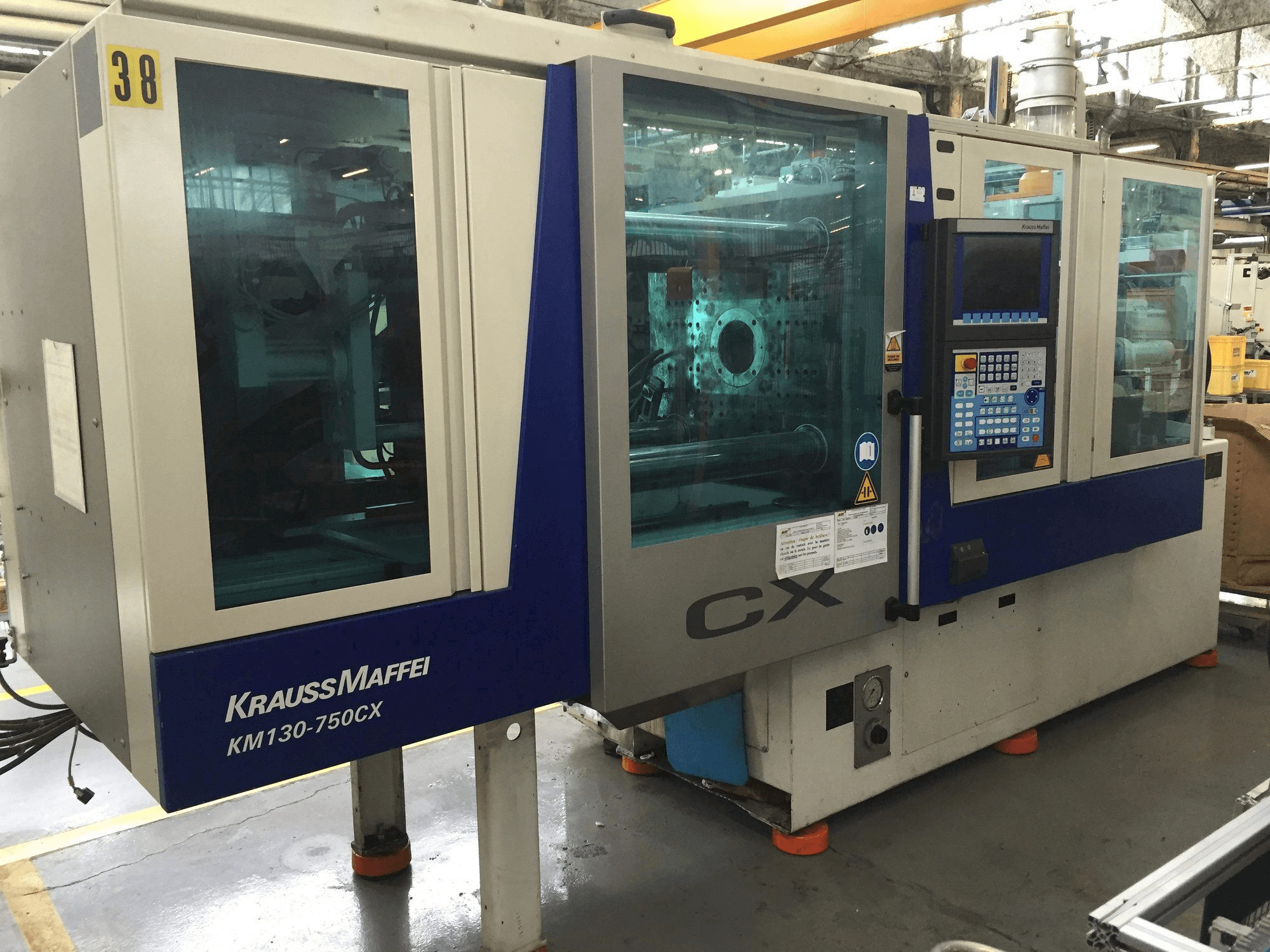 Krauss Maffei 130-750 CX Mašinos vaizdas iš priekio