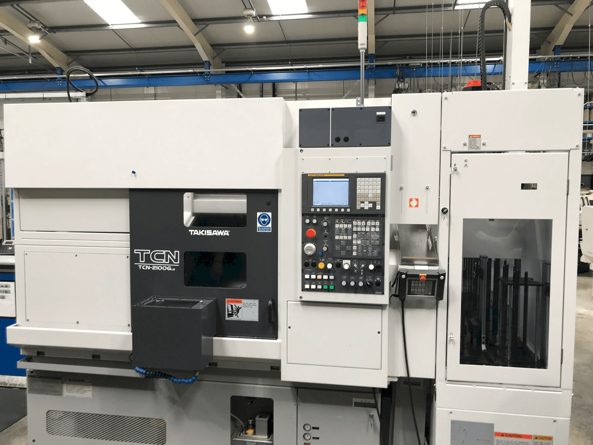 Takisawa TCN-2100G L6 Mašinos vaizdas iš priekio