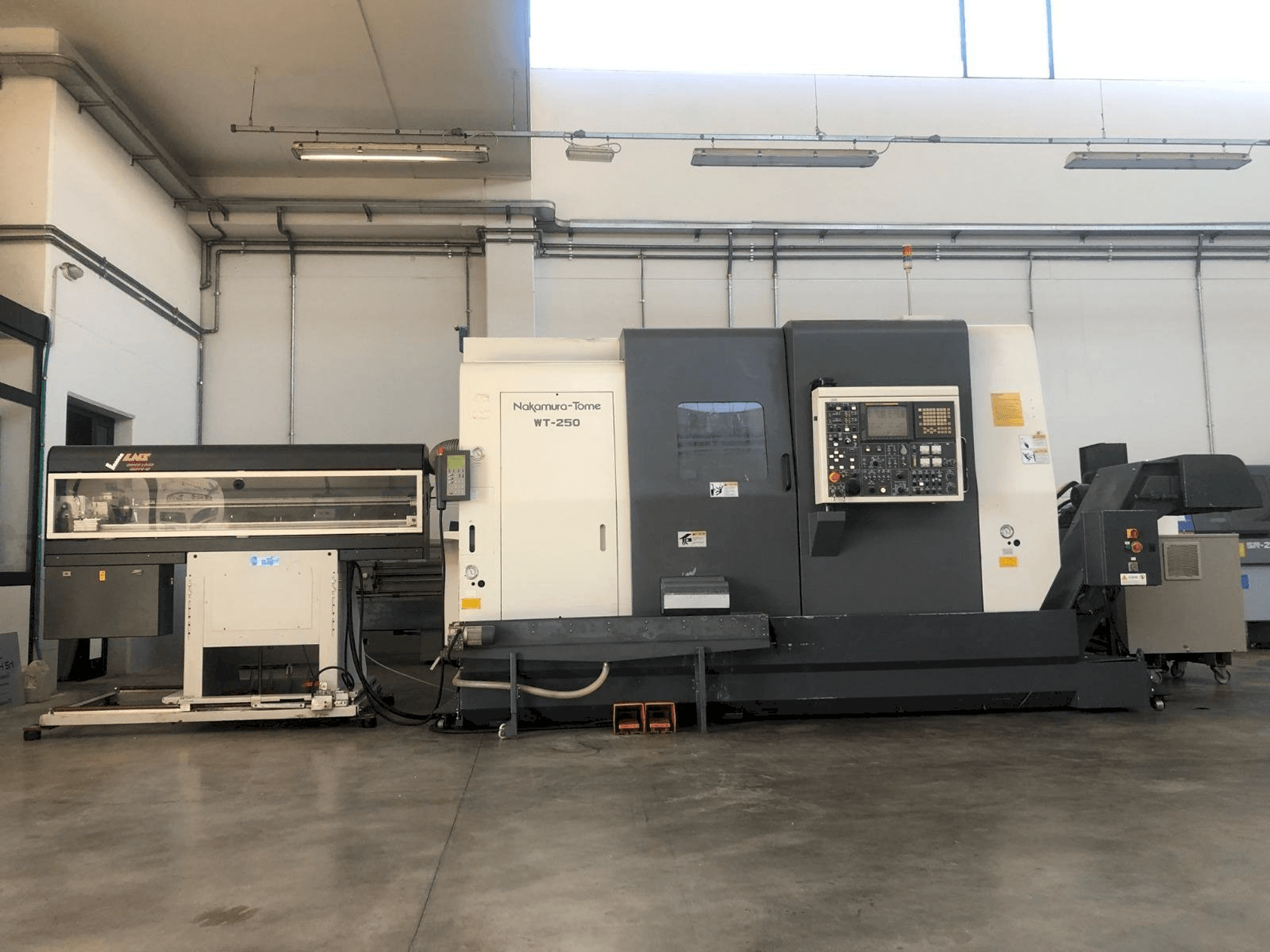 NAKAMURA-TOME WT-250 MMY Mašinos vaizdas iš priekio