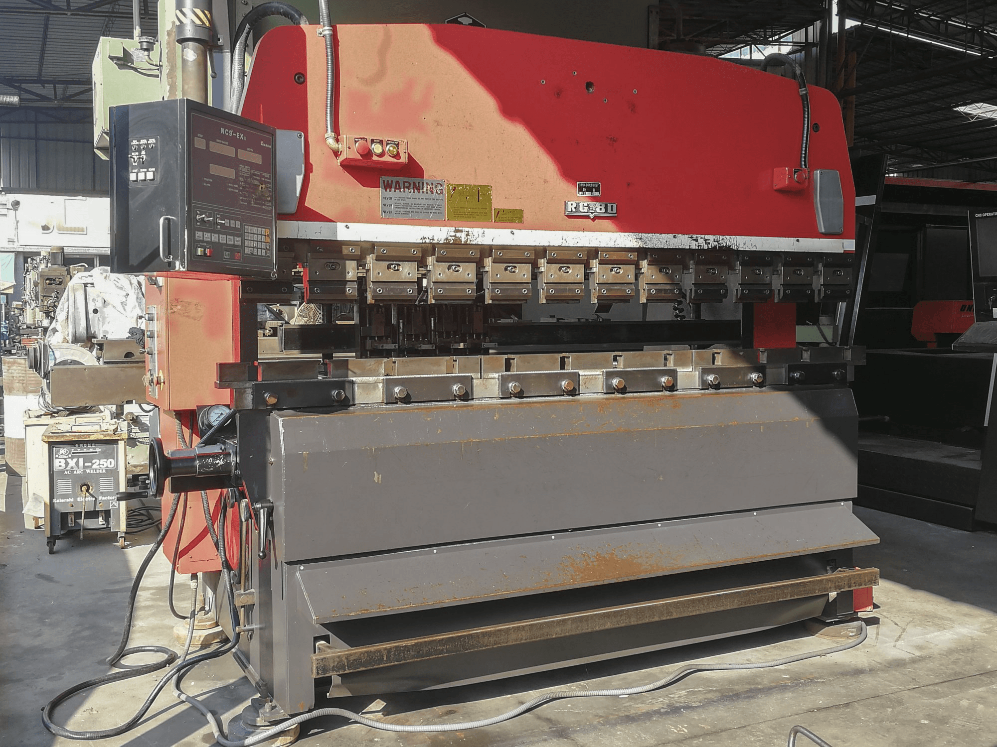 Front view of AMADA RG-80 Machine